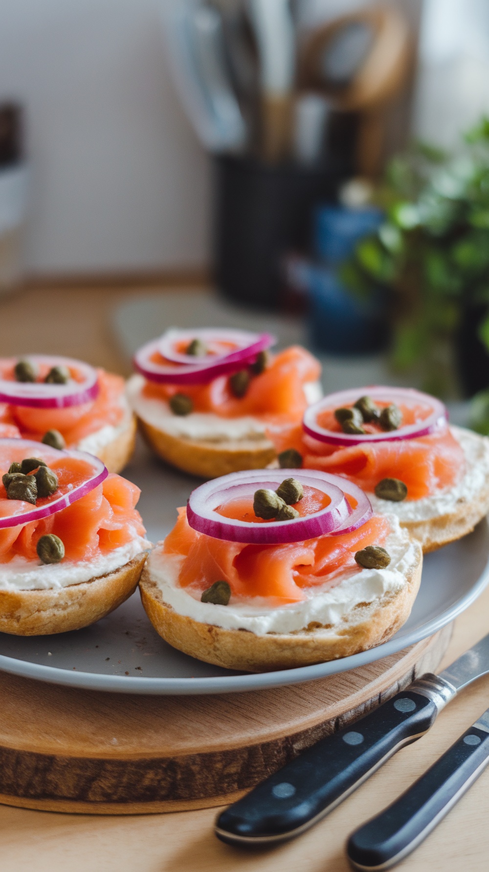 Sourdough bagels topped with lox, cream cheese, red onion, and capers.