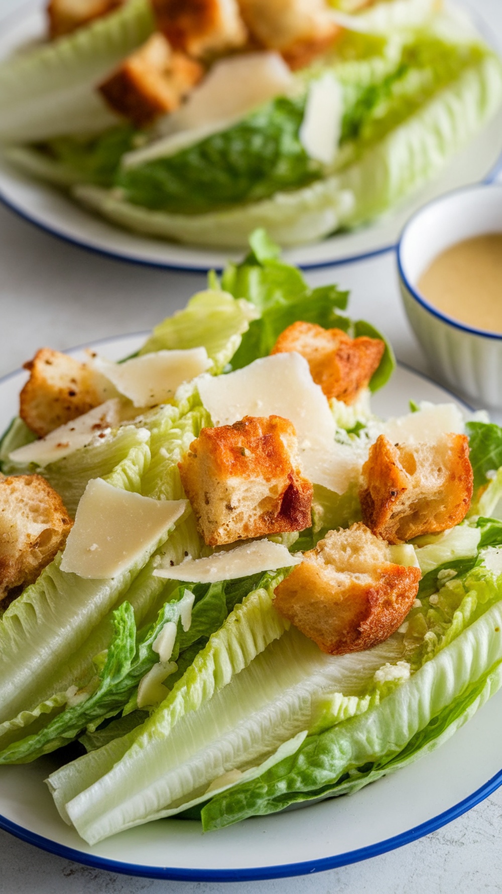 A classic Caesar salad with romaine lettuce, croutons, and Parmesan cheese.