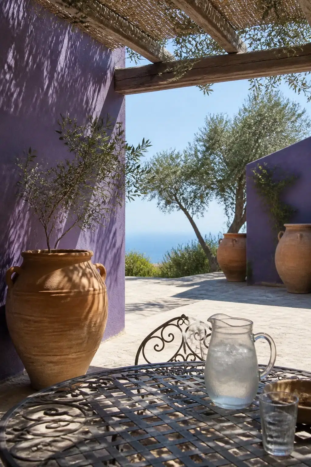mediterranean patio featuring African Violet by Sherwin-Williams