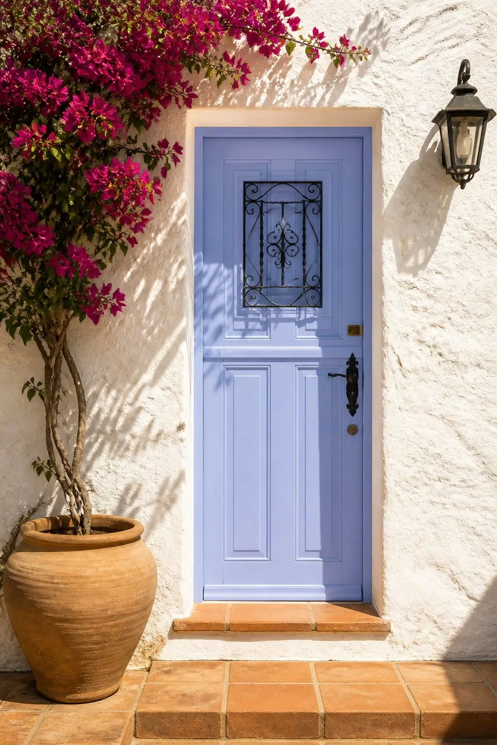 mediterranean front door featuring Awesome Violet by Sherwin-Williams